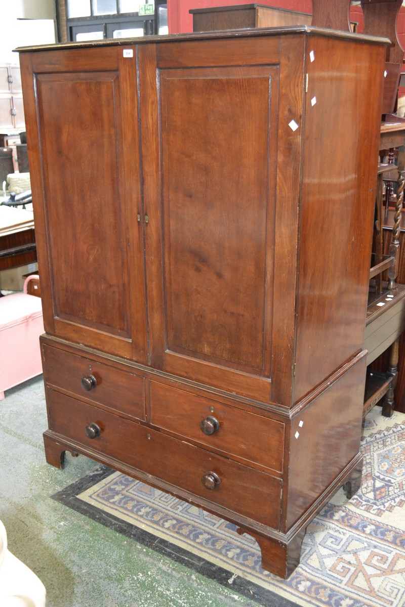 A Victorian mahogany linen press (converted to a wardrobe), two fielded panel doors to top,