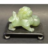 A Chinese jade Fo dog with ball,