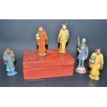 A Chinese cinnabar lacquer box; Chinese republican period stoneware figures;