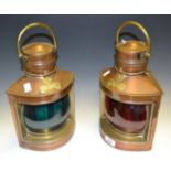 A pair of brass ships lanterns,