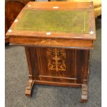 A Victorian mahogany Davenport, tooled leather inlay.