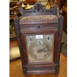 A Victorian Neo-Gothic oak bracket clock,