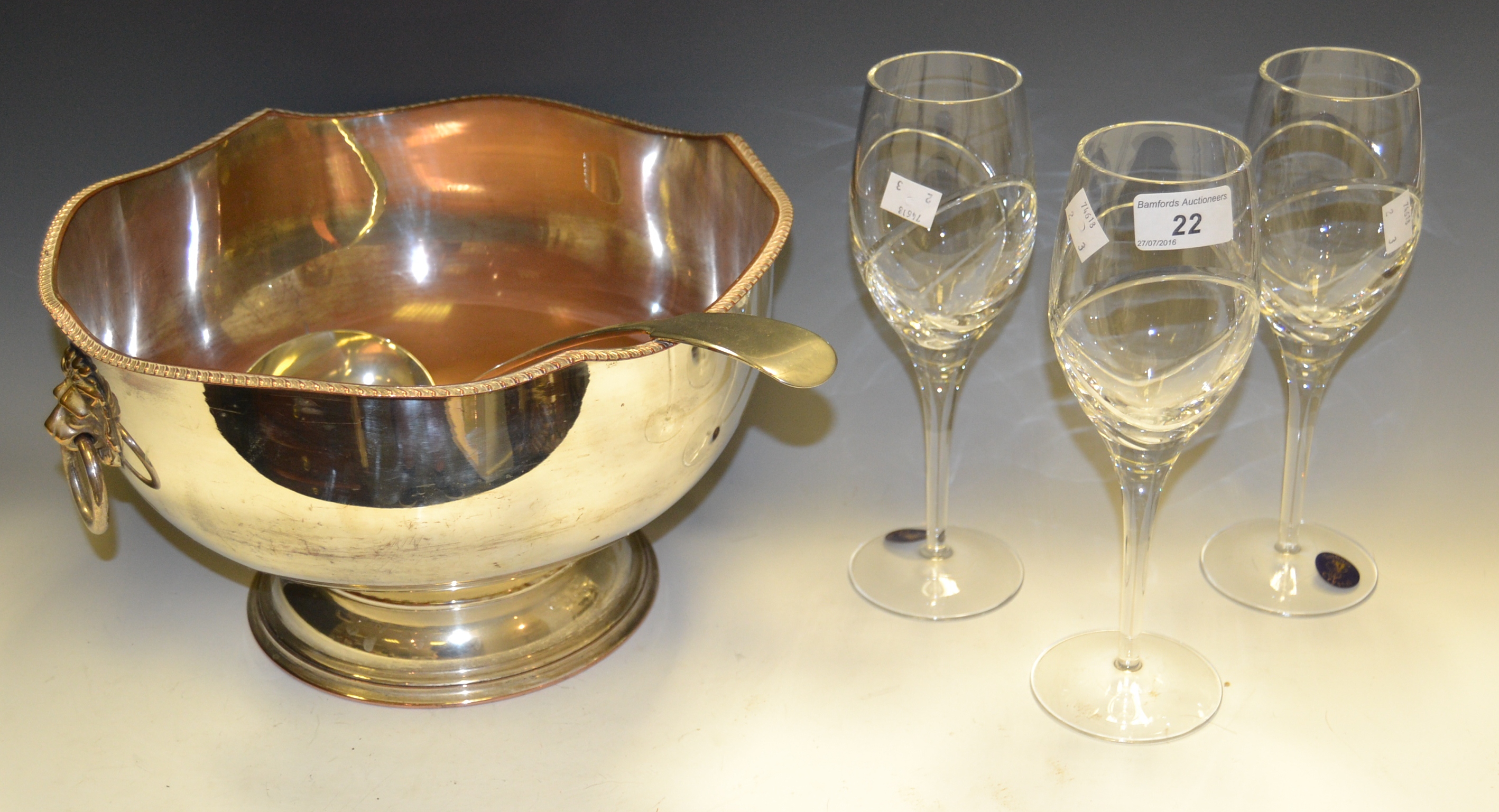 A set of 3 Tutbury crystal wine goblets; an EPNS punch bowl and ladle.