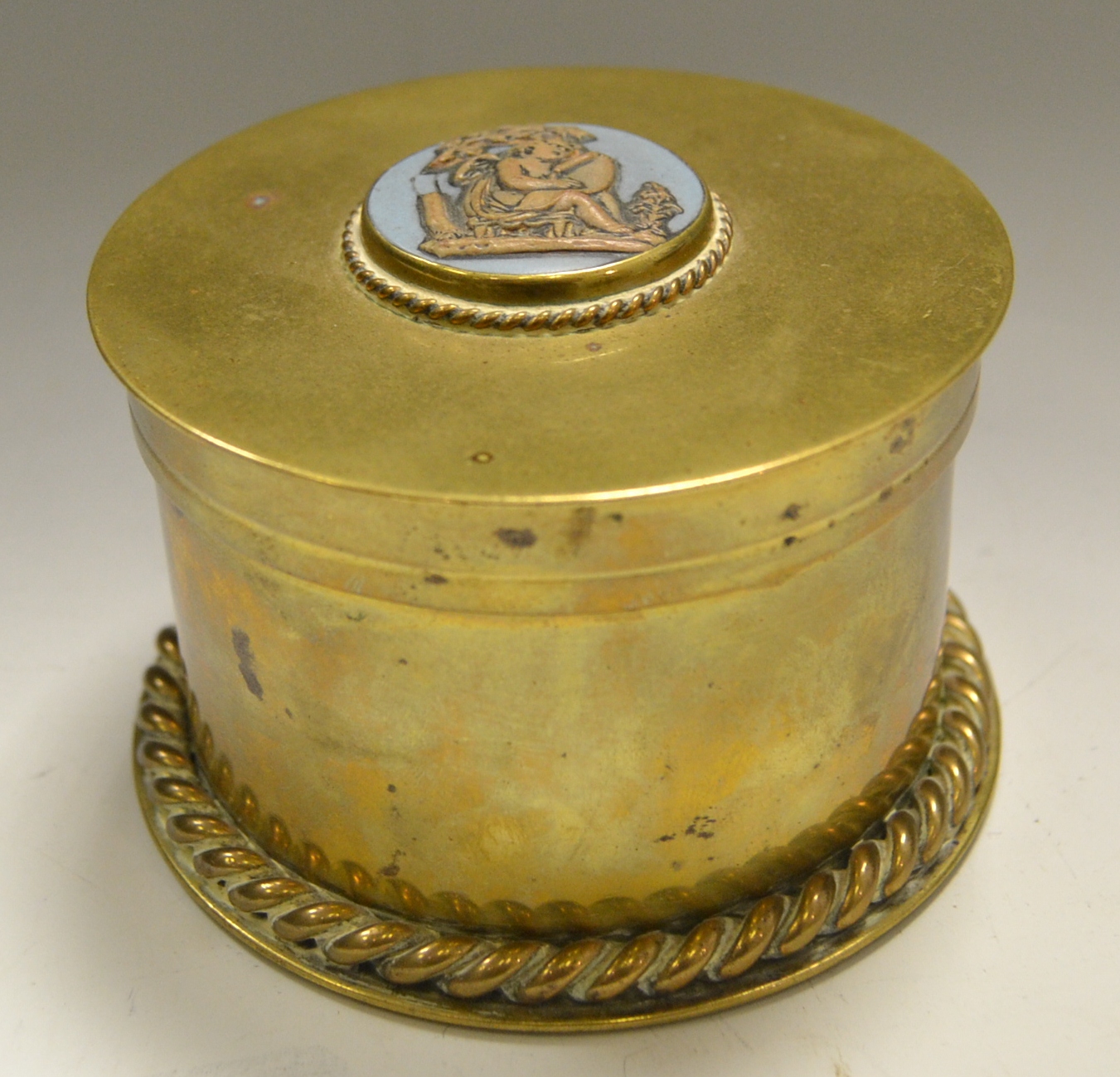 A 19th century Jasperware mounted cylindrical box and cover