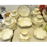 An Alfred Meakin 'Tweed' pattern part tea service comprising of two bread and butter plates,