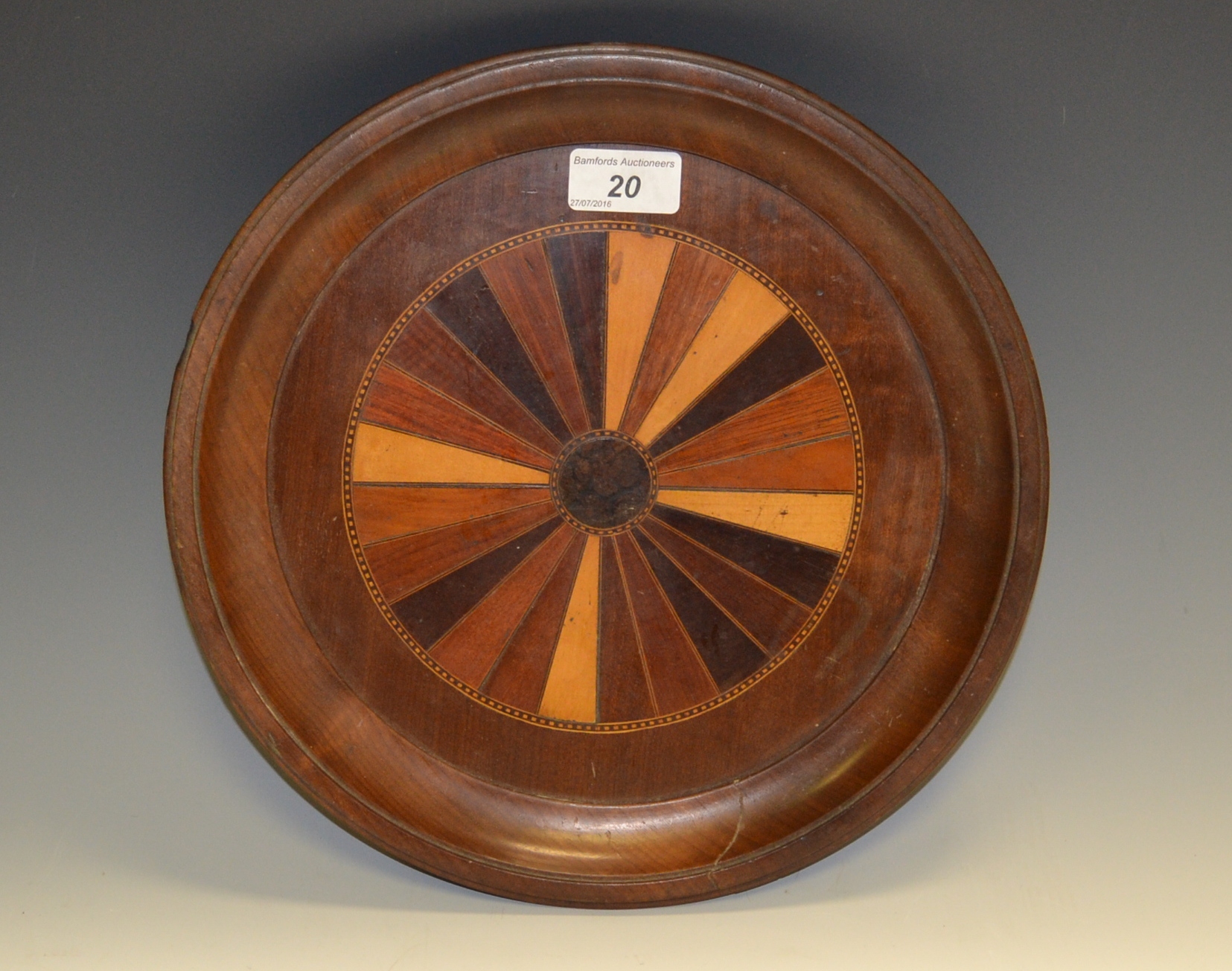 Treen - a George III mahogany and specimen wood circular waiter, moulded border,