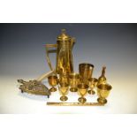 An Art Nouveau brass coffee pot; a set of four 19th century brass egg cups,