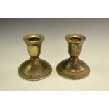 A pair of sterling silver boudoir candlesticks