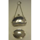 A silver purse , fitted finger chain, Birmingham 1912; a silver oval box,