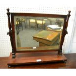 A Regency swing frame toilet mirror, bevelled plate shaped base,