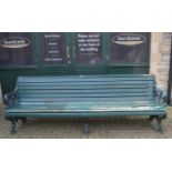 A Victorian Coalbrookdale style cast iron and slatted wood garden bench, acanthus scroll ends,