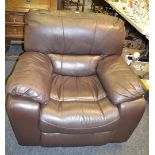 A contemporary leather electrical recliner chair