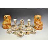 An early 20th century Staffordshire dressing table set; a pair of 20h century Spaniels,