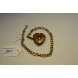 A late 19th century brass novelty heart shaped vesta;