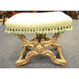 A 19th century giltwood X-frame stool, stuffed-over seat,