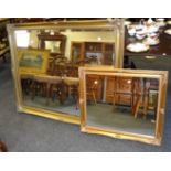 A large gilt framed mirror,