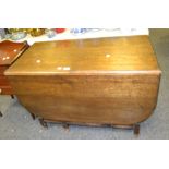 An oak drop leaf table, barley twist supports, c.1930.