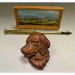 A primitive Irish miniature oil on board, Distant Hills; a carved head of a Collie Dog,