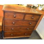 A Victorian mahogany chest of drawers, two short cockbeaded drawers above three long,