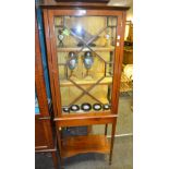 An Edwardian mahogany and satinwood crossbanded display cabinet, astragal glazed door,