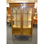 A pair of Edwardian mahogany and marquetry display cabinets,