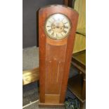 An Art Deco grandmother clock, Roman Numerals, twin winding holes, secondary apperture dial,