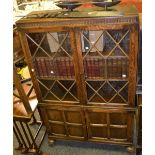 An oak bookcase, astragal glazed doors, c.1930.