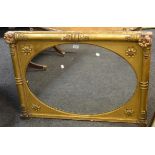 A gilt over mantel mirror, carved pilaster frames,