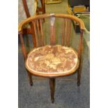 An Edwardian mahogany salon tub chair,