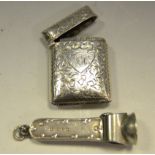 A late Victorian silver vesta case, Birmingham 1906; a Victorian silver cigar piercer,