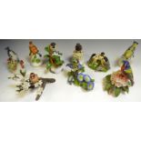 A Franklin Mint bird model, European Goldfinch; others similar, some as bells, Goldcrest, Wren,