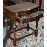 An early 20th century oak canteen on stand,