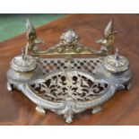 A 19th century French gilt brass desk stand,