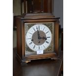 A German mantel clock, by Martime, silvered chapter ring, brass corner mounts, Roman numerals,