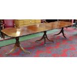 A large George III style mahogany dining table, reeded splayed legs, paw casters, 347cm long,