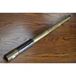 An early 20th century three draw brass telescope, no.