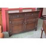 An oak Jaycee sideboard, rectangular oversailing top,