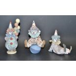 A Lladro figure Littlest Clown No 05811; others Tired Friend 05812; Having A Ball 05813,