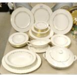 A Royal Worcester gold chantilly pattern dinner service for eight, vegetable dish,