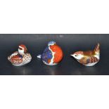 A Royal Crown Derby paperweight, wren; others, robin and swimming duckling, gold stoppers,