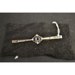 An Art Deco diamond and sapphire brooch,