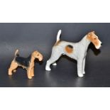 A Beswick model of a Wired-haired Terrier ; another smaller,