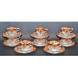 An Edwardian Radford pottery tea service, decorated in the Imari palette, including cups, saucers,