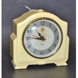 An Art Deco 1950s Smiths CA model Sectric alarm clock, cream case, silvered dial,