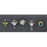 A sterling silver dress ring set with cubic zirconia; others similar,