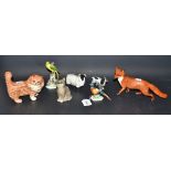 A Beswick model of a fox, 23cm long; a Beswick Ram, ginger cat, spaniel,