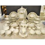 An extensive Royal Doulton Larchmont pattern tea and dinner service, including tea and coffee pots,
