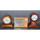 Clocks - a Fox & Simpson balloon clock; a Woodford oak cased mantel clock;