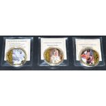 A set of three gold-plated Diamond Jubilee medallions,