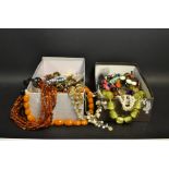 Costume Jewellery - a string of simulated amber beads; others, bangles, watches,